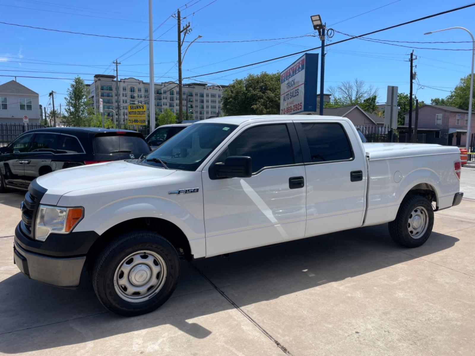 2013 White /Gray Ford F-150 XL (1FTFW1CF1DK) with an 5.0L V8 engine, 6-Speed Automatic transmission, located at 1501 West 15th St., Houston, 77008, (713) 869-2925, 29.797941, -95.411789 - Photo #0